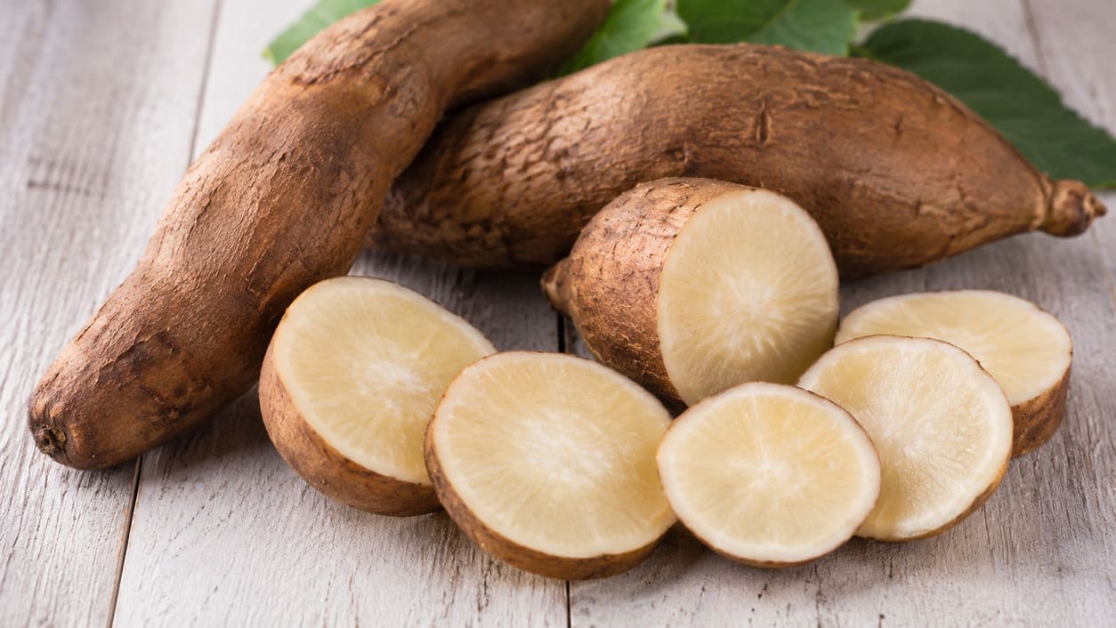 Whole and sliced Yacon root